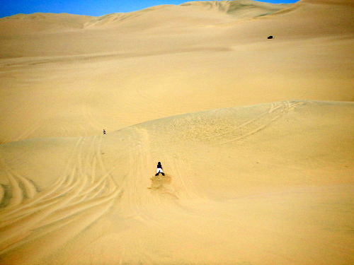 Sand Surfing the Dunes of Huaca China, Peru.